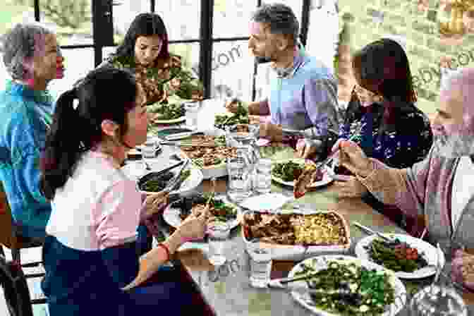 A Group Of People Sharing A Meal And Laughing, Capturing The Essence Of Ichigo Ichie The Abundance Of Less: Lessons In Simple Living From Rural Japan