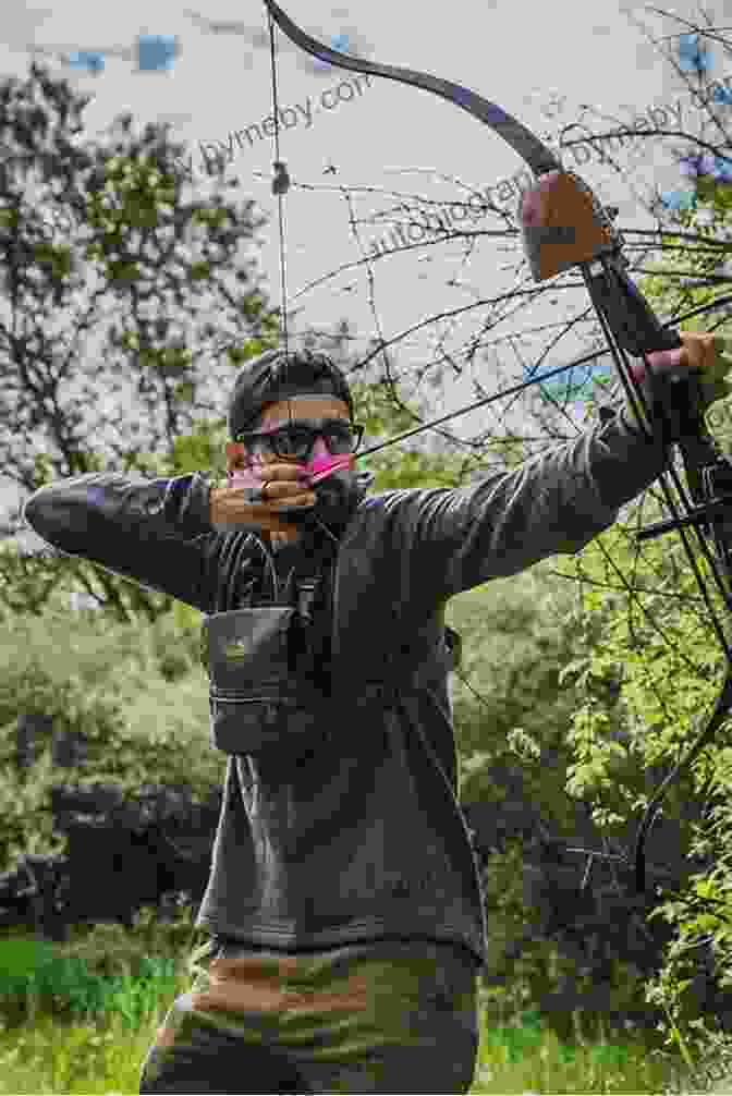 A Hunter Aiming A Bow And Arrow, Demonstrating The Art Of Hunting In The Wilderness Outdoor Survival Skills Larry Dean Olsen