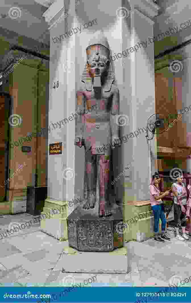 A Majestic Statue Of A Pharaoh, Exuding Power And Authority, Reflecting The Divine Status Attributed To Egypt's Rulers. Ancient Egypt: Anatomy Of A Civilization