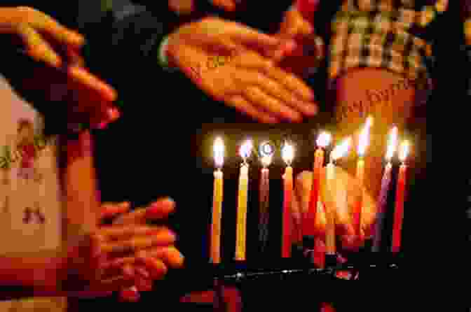 A Person Holding A Copy Of 'Light The Menorah Handbook' Light The Menorah : A Hanukkah Handbook