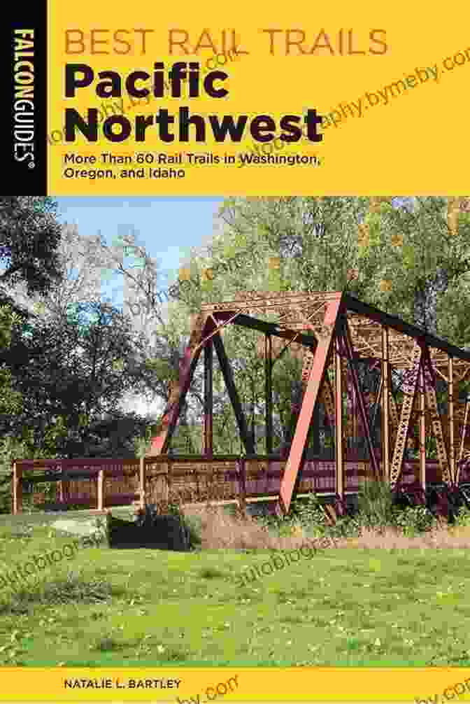 Book Cover Of 'Best Rail Trails Pacific Northwest' Against A Backdrop Of A Scenic Rail Trail. Best Rail Trails Pacific Northwest: More Than 60 Rail Trails In Washington Oregon And Idaho (Best Rail Trails Series)