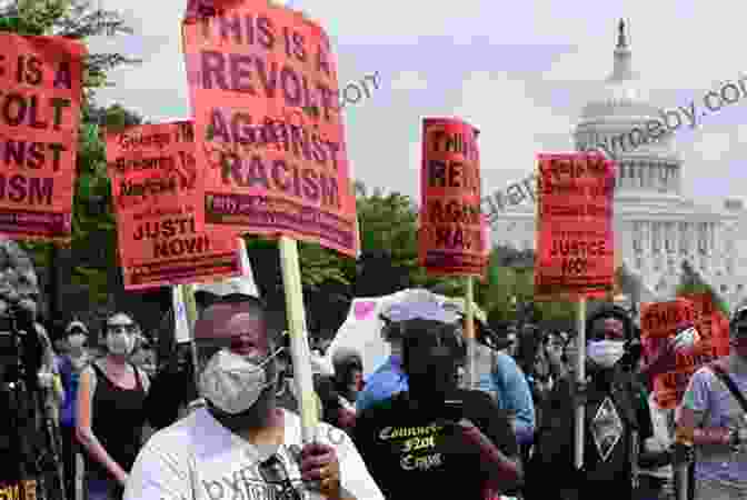 Ethan James Speaking At A Protest, Holding A Sign That Reads 'Education For All' Trying To Fix Stupid: The Autobiography Of A Maverick Professor