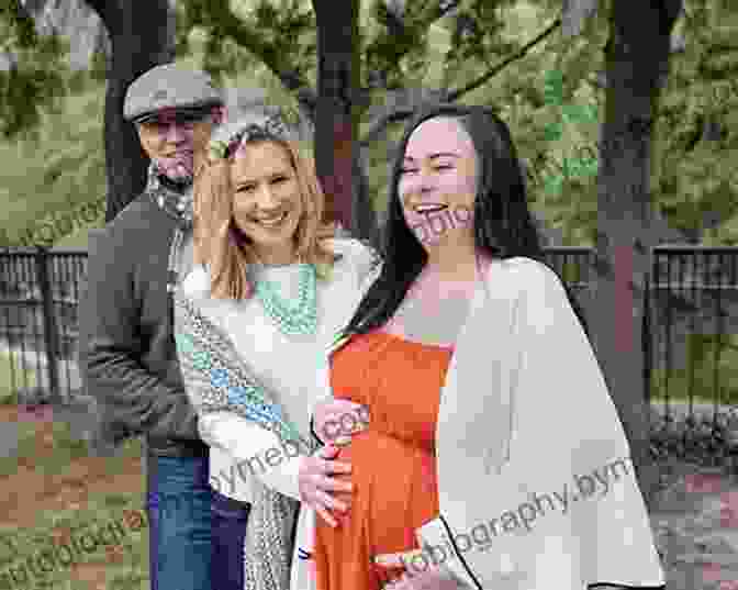 Image Of A Happy Family Posing With The Surrogate Who Helped Them Become Parents More Than Just A Baby: A Guide To Surrogacy For Intended Parents And Surrogates