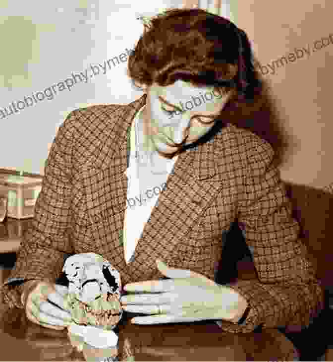 Mary Leakey, The Pioneering Paleontologist, Holds A Fossilized Skull. Fossil Huntress: Mary Leakey Paleontologist (Picture Biography)